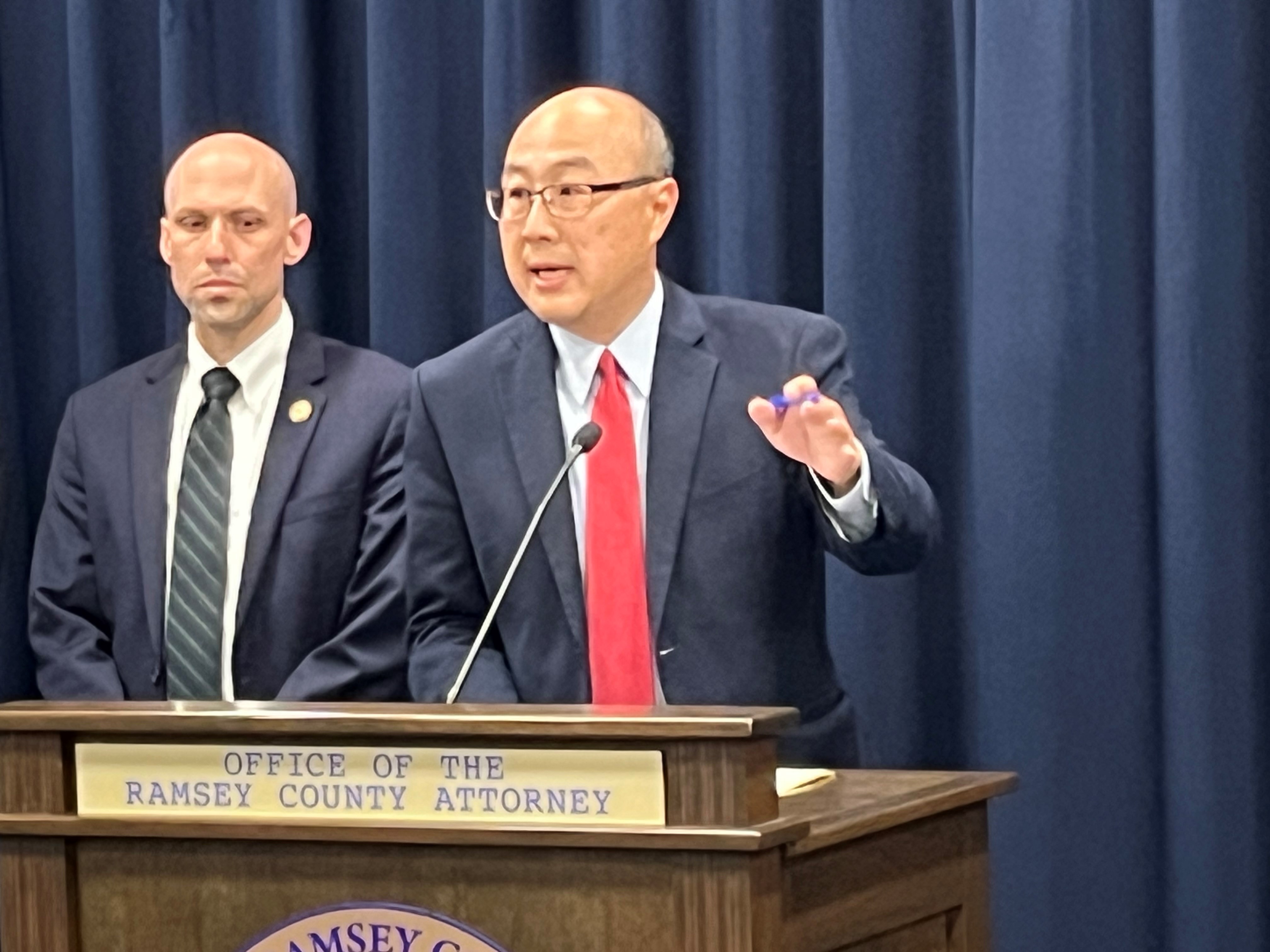 Ramsey County Attorney John Choi giving a press conference