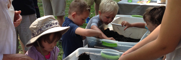 Four young kids participating in a Tamarack Nature Center program